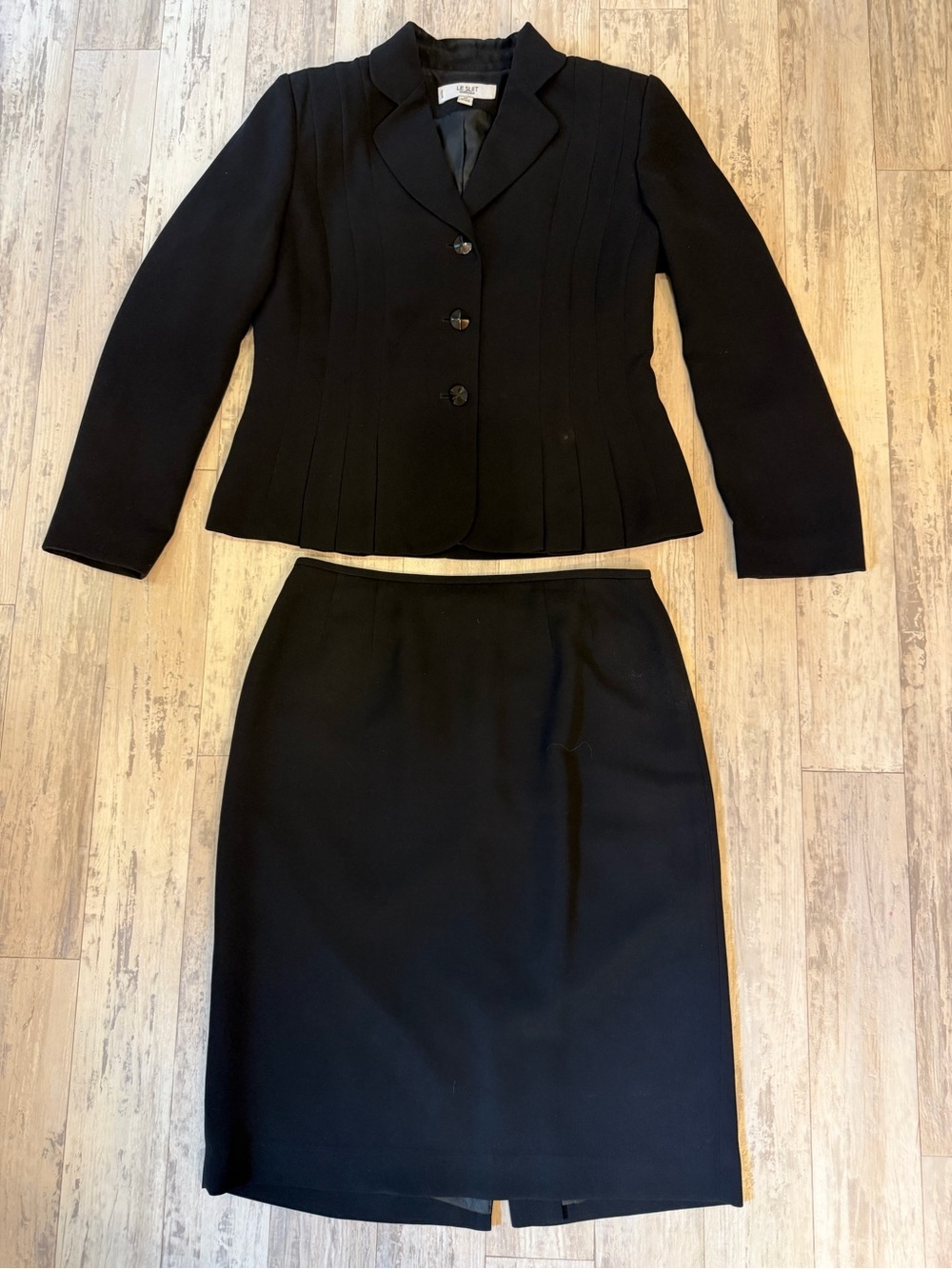 Le Suit Black Two-Piece Skirt Suit